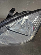 2000-2004 Ford Focus Left Headlamp Assembly #114-600B