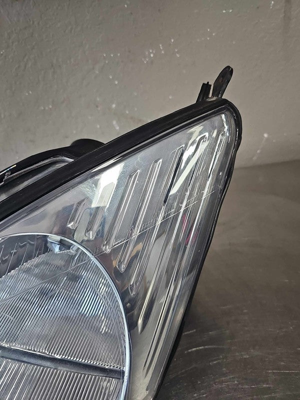 2000-2004 Ford Focus Left Headlamp Assembly #114-600B