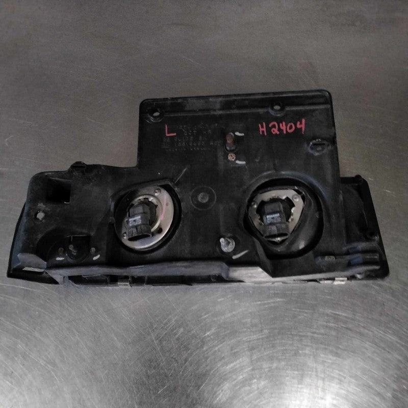 1995-2005 GMC Safari Left Headlamp Assembly OEM#16524091
