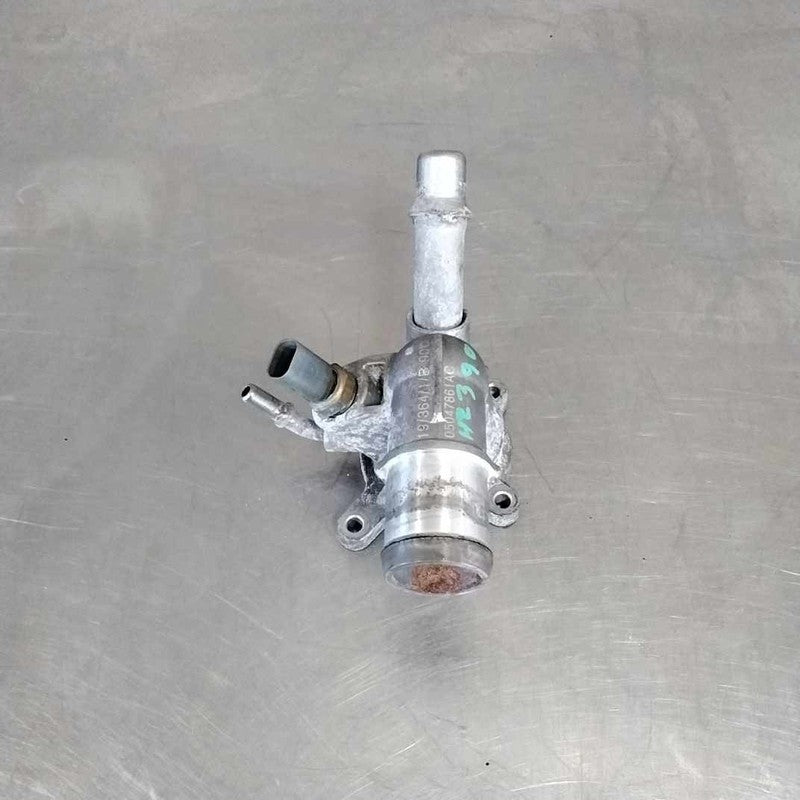 2016 Jeep CherokeemThermostat Housing OEM# 5184653AF