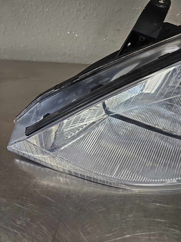 2000-2004 Ford Focus Left Headlamp Assembly #114-600B
