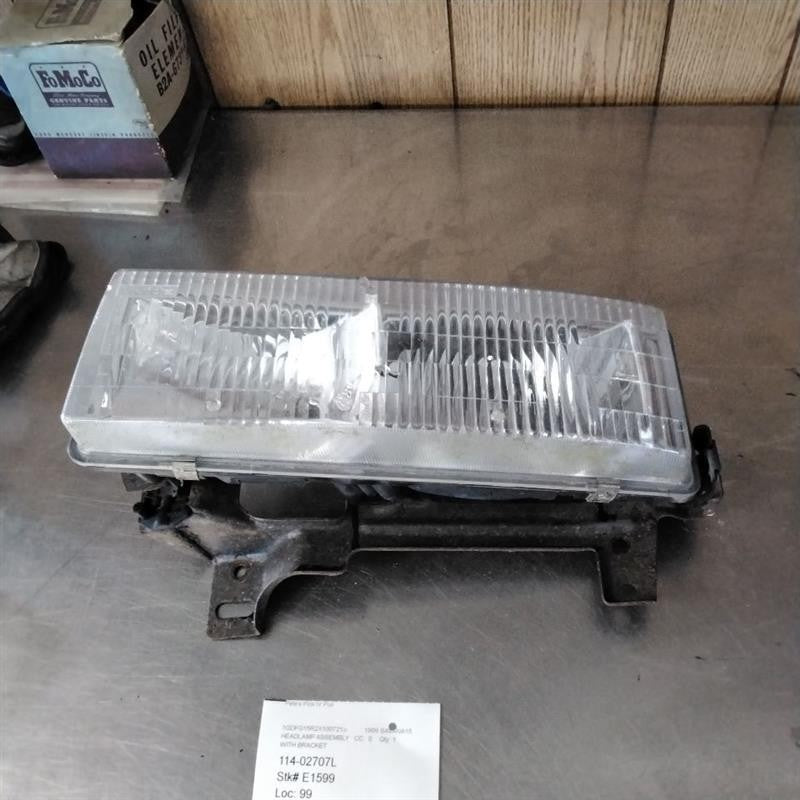 1996-2002 GMC Van Savana 1500 Left Headlamp Assembly OEM#16522159