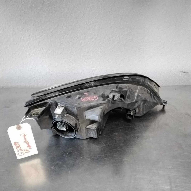 2005-2007 Ford Focus Left Headlamp Assembly OEM#7S4Z13008F