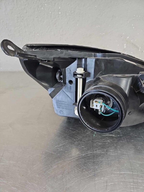 2000-2004 Ford Focus Left Headlamp Assembly #114-600B