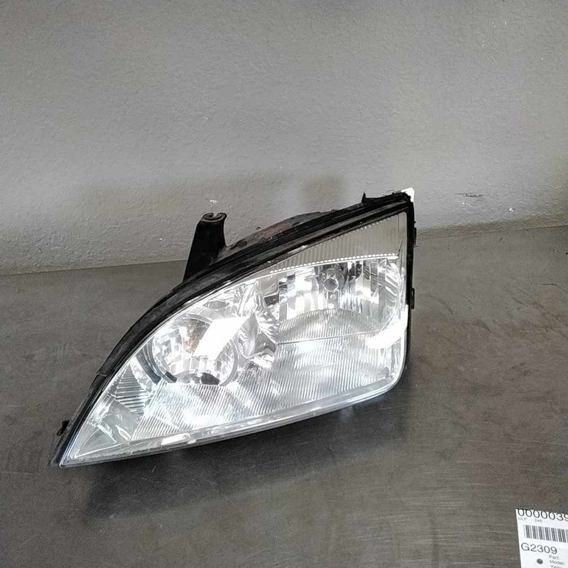 2005-2007 Ford Focus Left Headlamp Assembly OEM#7S4Z13008F
