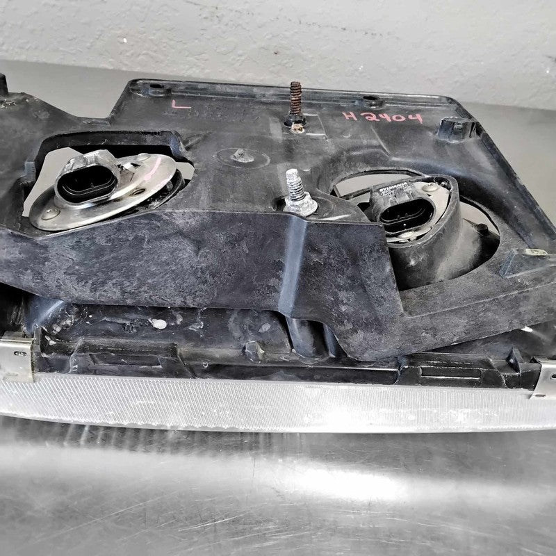 1995-2005 GMC Safari Left Headlamp Assembly OEM#16524091