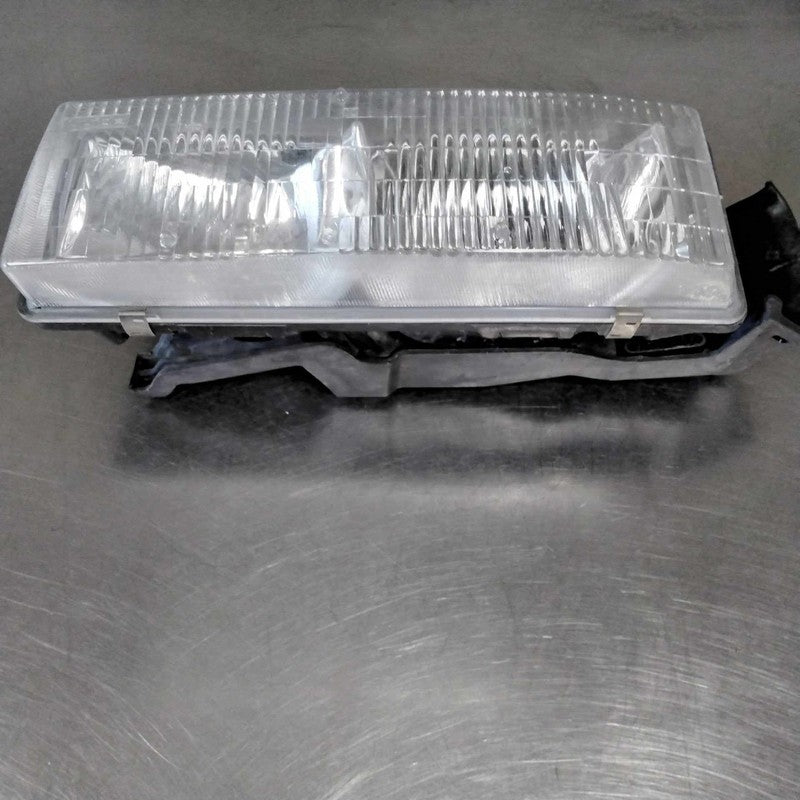 1995-2005 GMC Safari Left Headlamp Assembly OEM#16524091