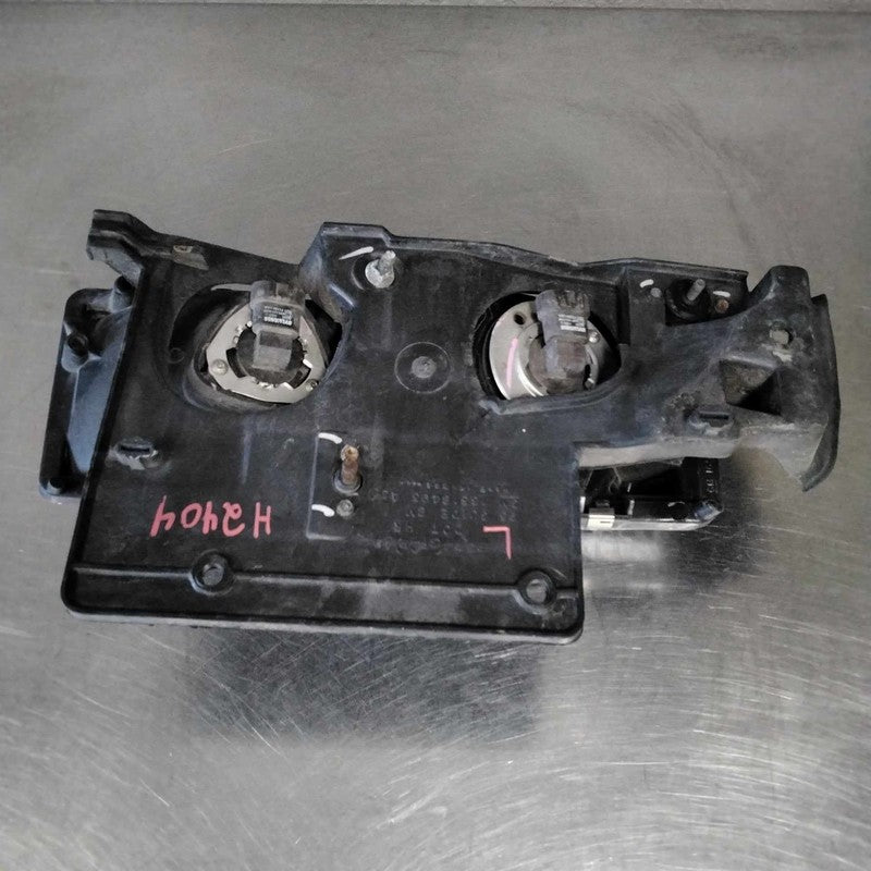 1995-2005 GMC Safari Left Headlamp Assembly OEM#16524091
