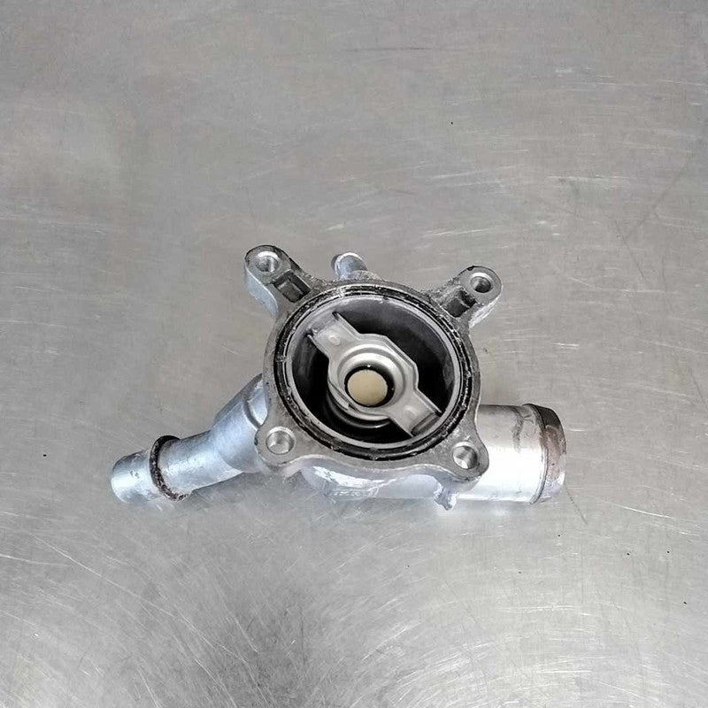2016 Jeep CherokeemThermostat Housing OEM# 5184653AF